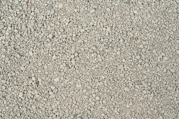 Small rocks ground texture background. white road stone. gravel pebbles stone texture. crushed...