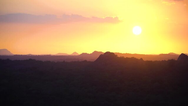 Colorful sunset over jungle and rainforest. Sri Lanka.