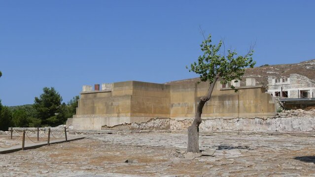 Heraklion, Greece - July 15, 2022: The world famous Knossos Palace of King Minos where Theseus killed the Minotaur. The ruins of the famous architectural monument of Bronze Age, Minoan civilization
