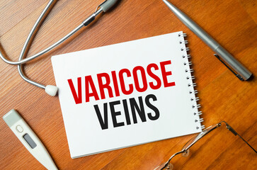 The word VARICOSE is written on a white sheet near the stethoscope