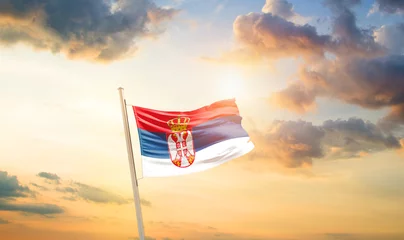 Foto op Canvas Serbia national flag cloth fabric waving on the sky - Image © Faraz