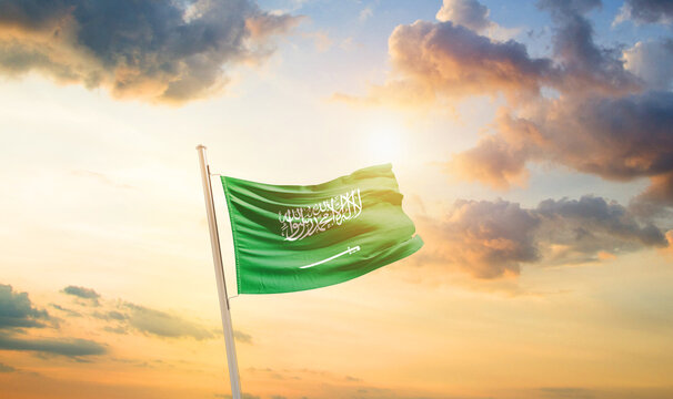 Saudi Arabia national flag cloth fabric waving on the sky - Image