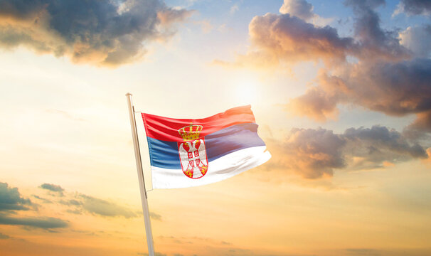 Serbia national flag cloth fabric waving on the sky - Image