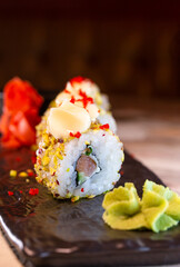 rice rolls with Japanese cuisine tobiko serving in the restaurant
