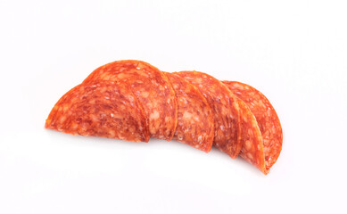 Salami slices, isolated. Meat cold cuts on a white background. Packshot photo.