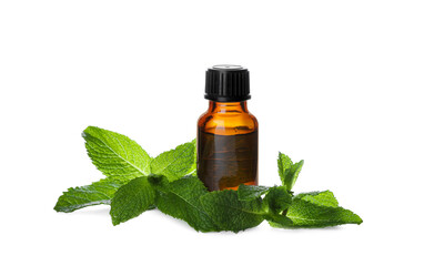 Bottle of essential oil and mint on white background