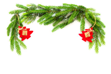 christmas decoration with fir branches, cones and toy balls, isolated