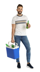 Happy man with cool box and bottles of beer on white background