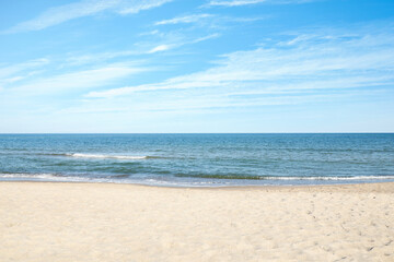 Fototapeta na wymiar Picturesque view of sandy beach near sea