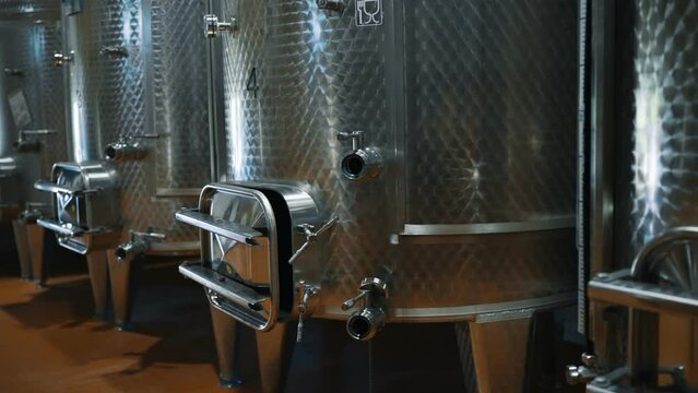 Modern wine factory interior with reservoirs.