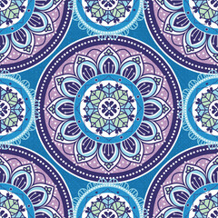 Seamless vector pattern of a brightly colored mandala. Great for teens, tweens, young women's fashion and fun.