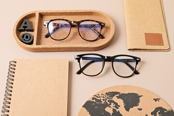 Stylish eyeglasses over pastel background. Optical store, glasses selection, eye test, vision...