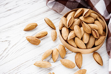fresh almonds in shell on a white background
