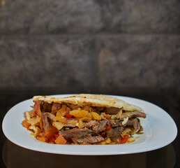 Delicious arepa with meat and pineapple for everyone's taste