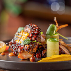 Fototapeta na wymiar Grilled Octopus with Corn and Cucumber.