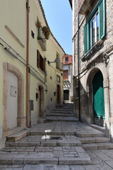 Fototapeta na wymiar A narrow street in Trivento, a mountain village in the Molise region of Italy.