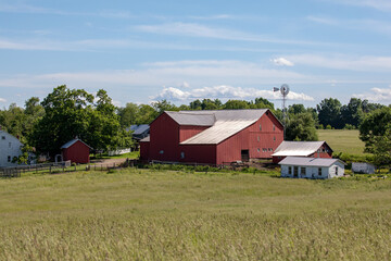 Red Amish farm buildings in the rural countryside | Holmes County, Ohio