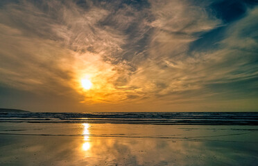 Fototapeta na wymiar Sunset over Gwithian Beach (Gwithian Towans) - Hayle, Cornwall, United Kingdom