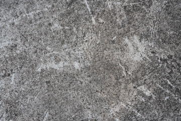 Grey Abstract old dirty dark cement wall background on ground texture.