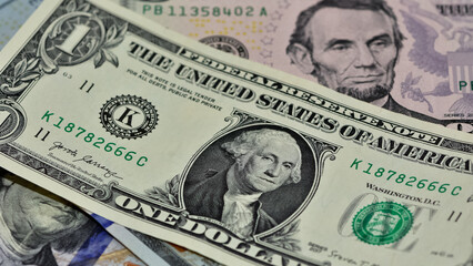 Obraz na płótnie Canvas various country banknotes. us dollar photos