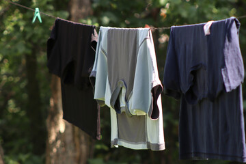 wet clothes are drying outside