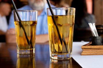 close up view of summertime refreshing drinks on table in cafe