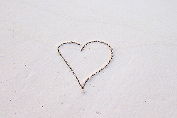 handwritten heart on the sand, the concept of travel and greetings for Valentine's Day