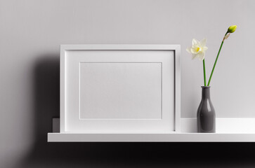 Landscape frame mockup on grey wall with flowers on white shelf