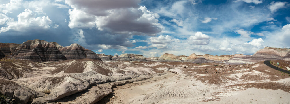 Panorama of The Painted Desert in Arizona on a Cloudy Day with a Beautiful Sky looking at the Blue Mesa in Panorama