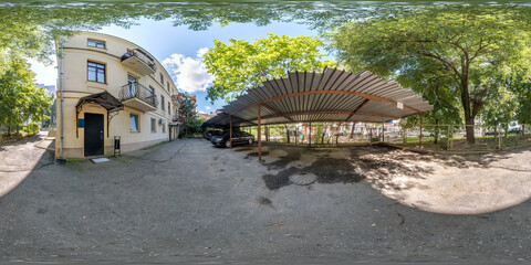  full seamless hdri panorma 360 angle view on parking with cars near buildings provincial town at...