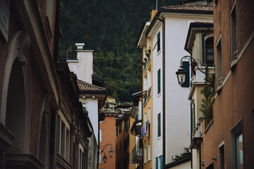 Italy. Trentino Riva del Garda. Houses and architecture of the city against the backdrop of...