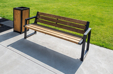 Wooden bench and wooden trash can