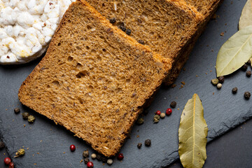Bread and crispbread with spices lies on the table