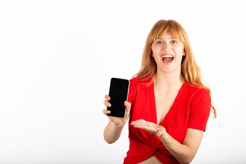 Happy young woman showing the phone screen.