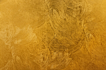 細い曲線で構成されたパターンのある金色の和紙