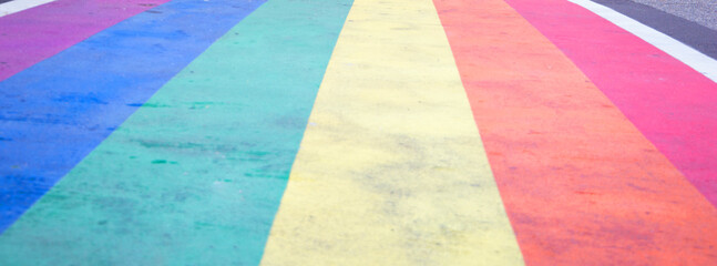 The crosswalk in downtown Seattle Washington painted with a rainbow - obrazy, fototapety, plakaty