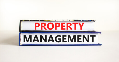 Property management symbol. Concept words Property management on books on a beautiful white table white background. Business property management concept. Copy space.