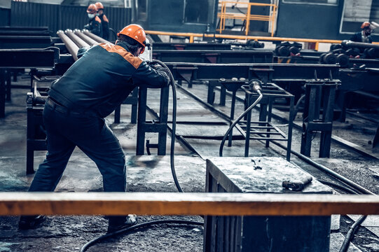 Worker at Steel Factory or Pipe Mill located in Taganrog South of Russia