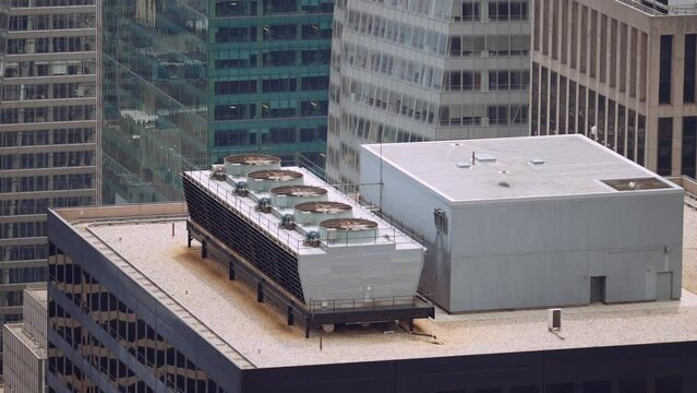 Fans of Air Conditioning System Spinning on Roof Top of Skyscraper, New York