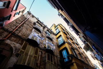 Old narrow street of Old Town of Napoli, traditional Italian architecture in Naples, Italy