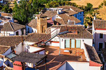 Beautiful roof patio at on of the old tiled houses in Ronda old town, Andalusia, Spain - obrazy, fototapety, plakaty