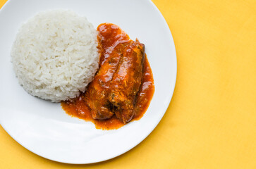 White rice with sardines in tomato sauce