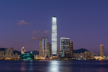 Scenery of skyscraper, skyline and harbor of Hong Kong city at dusk