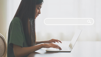 Women using computer laptop to find what they are interested in. Searching information data on...