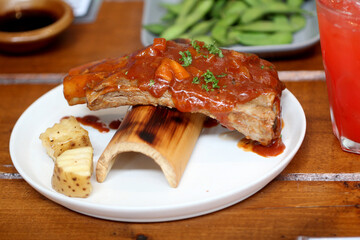 Delicious barbecued pork ribs with a spicy basting sauce