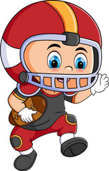 The rugby player boy is holding a ball in a competition
