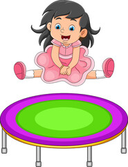 The cute girl with the pretty dress is jumping on the trampoline