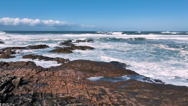 Turbulent seas and rocky coast at Blanch Reserve, Anna Bay, NSW, Australia.
