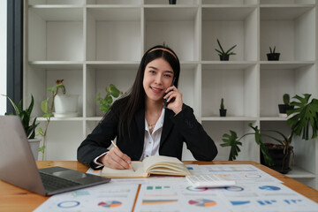 Portrait of Business woman or accountant or banker audit and analysis with financial costs wisely and carefully, investment and saving concept.