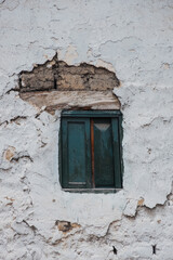 old window on a wall
